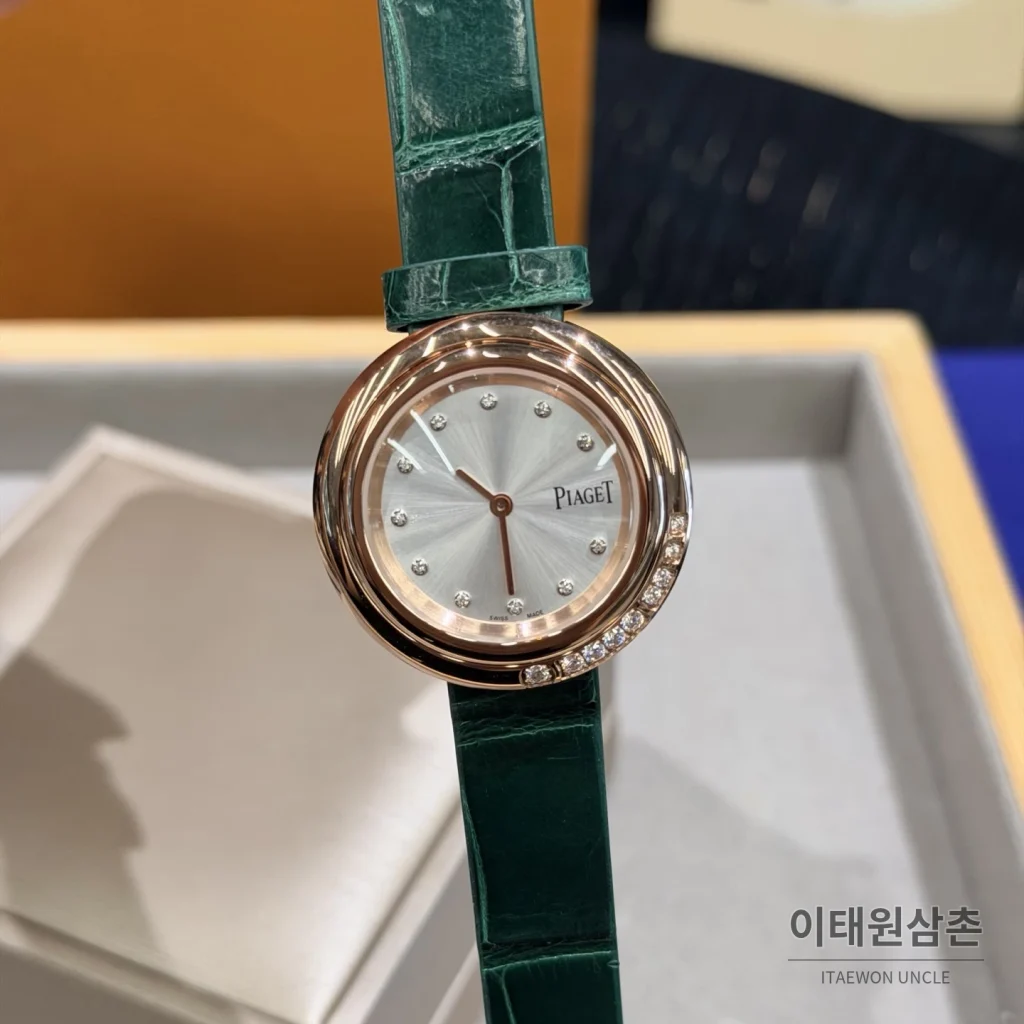 피아제 포제션 회전베젤 악어가죽 쿼츠 여성시계 골드