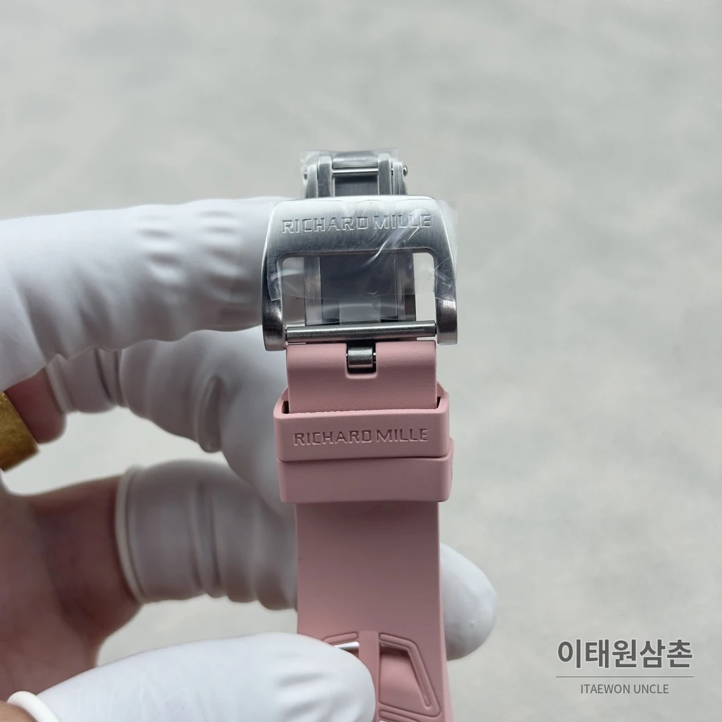 리차드밀 NTPT 카본 스켈레톤 오렌지 오토매틱 49.95mm 스켈레톤 다이얼 핑크 러버 스트랩