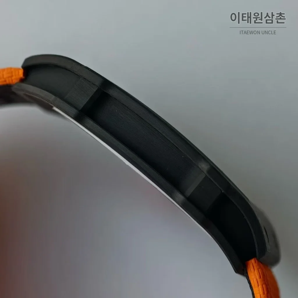 리차드밀 RM 67-02 오토매틱 스켈레톤 다이얼 오렌지 나일론 스트랩 카본 케이스