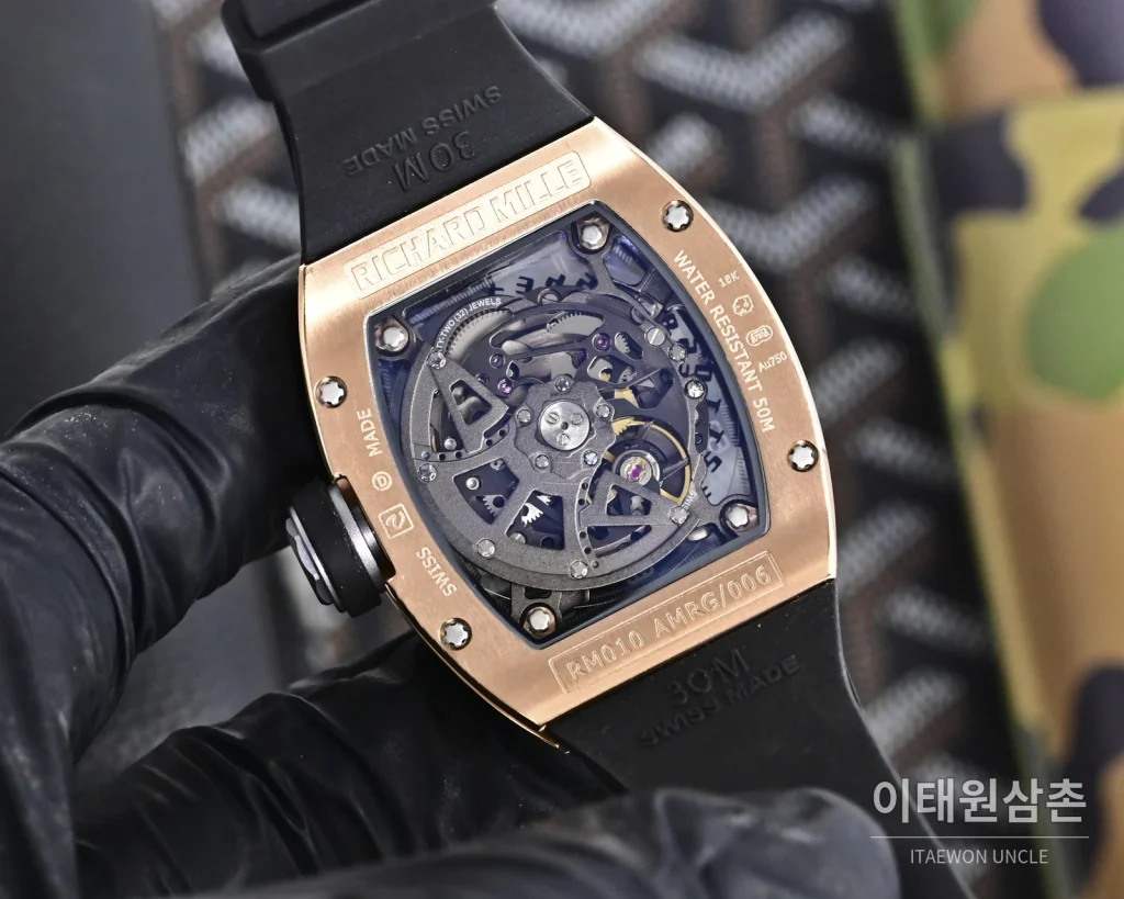 리차드밀 RM010 오토매틱 48mm 스켈레톤 다이얼 블랙 러버 스트랩