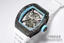 리차드밀 RM055 NTPT카본 블랙스켈레톤 수동 49.9mm 스켈레톤 다이얼 화이트 러버 스트랩 아이스블루 베젤