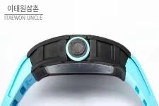 리차드밀 RM055 NTPT카본 블랙스켈레톤 수동 49.9mm 스켈레톤 다이얼 아이스블루 러버 스트랩 아이스블루 베젤