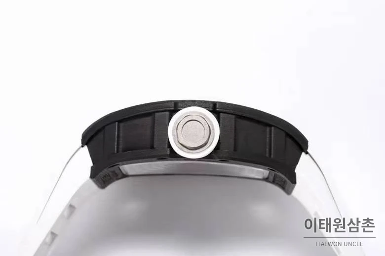 리차드밀 RM055 NTPT카본 블랙스켈레톤 수동 49.9mm 스켈레톤 다이얼 화이트 러버 스트랩 블랙 베젤
