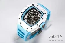 리차드밀 RM055 화이트세라믹 스켈레톤 수동 49.9mm 스켈레톤 다이얼 아이스블루 러버 스트랩 화이트 베젤