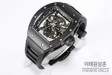 리차드밀 RM055 화이트세라믹 스켈레톤 수동 49.9mm 스켈레톤 다이얼 블랙 러버 스트랩 블랙 베젤