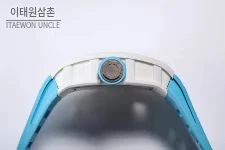 리차드밀 RM055 화이트세라믹 스켈레톤 수동 49.9mm 스켈레톤 다이얼 아이스블루 러버 스트랩 화이트 베젤