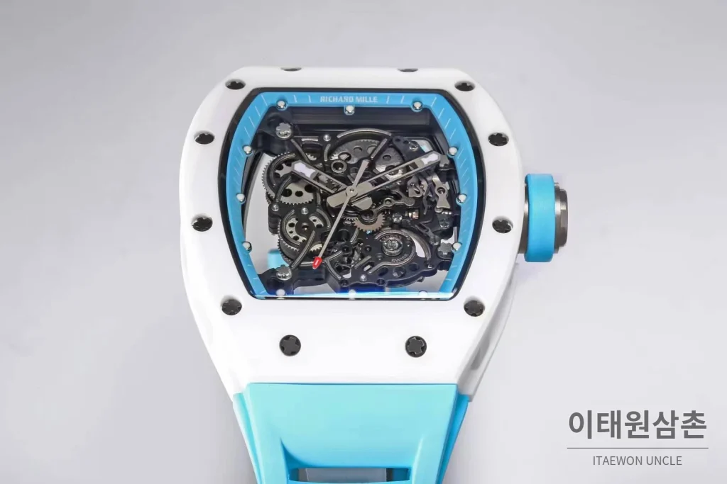리차드밀 RM055 화이트세라믹 스켈레톤 수동 49.9mm 스켈레톤 다이얼 아이스블루 러버 스트랩 화이트 베젤