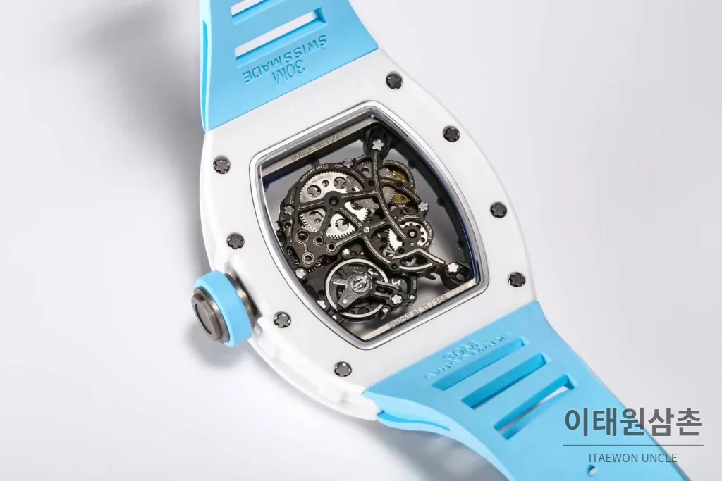 리차드밀 RM055 화이트세라믹 스켈레톤 수동 49.9mm 스켈레톤 다이얼 아이스블루 러버 스트랩 화이트 베젤