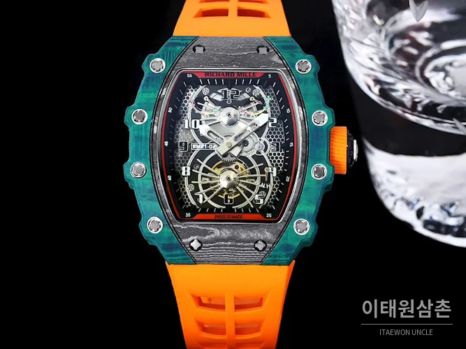 리차드밀 RM21-01 카본파이버 스켈레톤 오토매틱 50mm 블랙 오렌지 러버 스트랩 그린 베젤