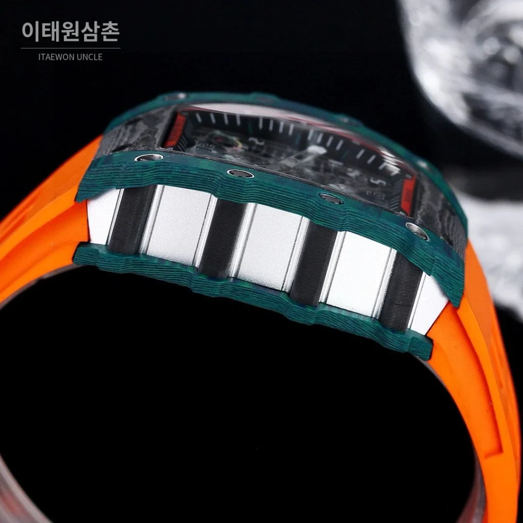 리차드밀 RM21-01 카본파이버 스켈레톤 오토매틱 50mm 블랙 오렌지 러버 스트랩 그린 베젤
