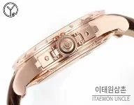 로저드뷔 엑스칼리버 로즈골드 스켈레톤 더블투르비옹 수동 45mm 화이트 다이얼 브라운 가죽 스트랩 로즈골드 베젤