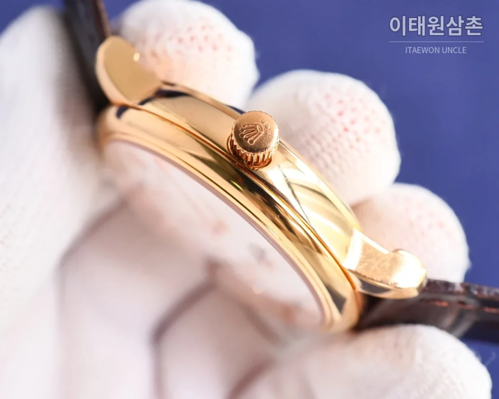 롤렉스 첼리니 문페이즈 오토매틱 40mm 화이트 다이얼 블랙 가죽 스트랩 골드 베젤