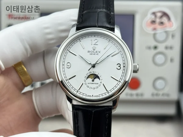 롤렉스 셀리니 문페이즈 블루에나멜 오토매틱 40mm 화이트 다이얼 블랙 가죽 스트랩
