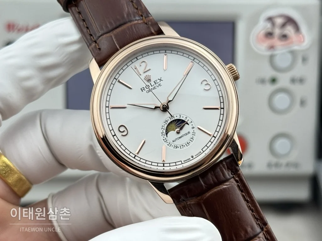 롤렉스 셀리니 문페이즈 블루에나멜 오토매틱 40mm 화이트 다이얼 브라운 가죽 스트랩 로즈골드 베젤