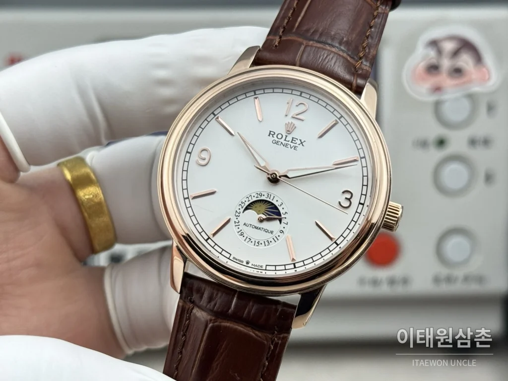 롤렉스 셀리니 문페이즈 블루에나멜 오토매틱 40mm 화이트 다이얼 브라운 가죽 스트랩 로즈골드 베젤