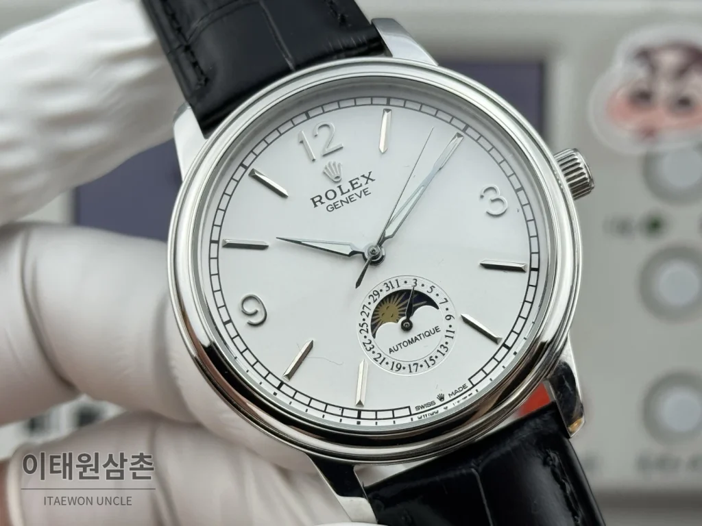 롤렉스 셀리니 문페이즈 블루에나멜 오토매틱 40mm 화이트 다이얼 블랙 가죽 스트랩