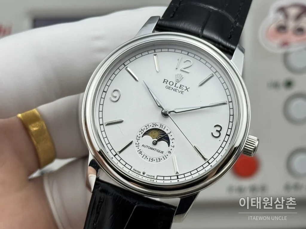 롤렉스 셀리니 문페이즈 블루에나멜 오토매틱 40mm 화이트 다이얼 블랙 가죽 스트랩