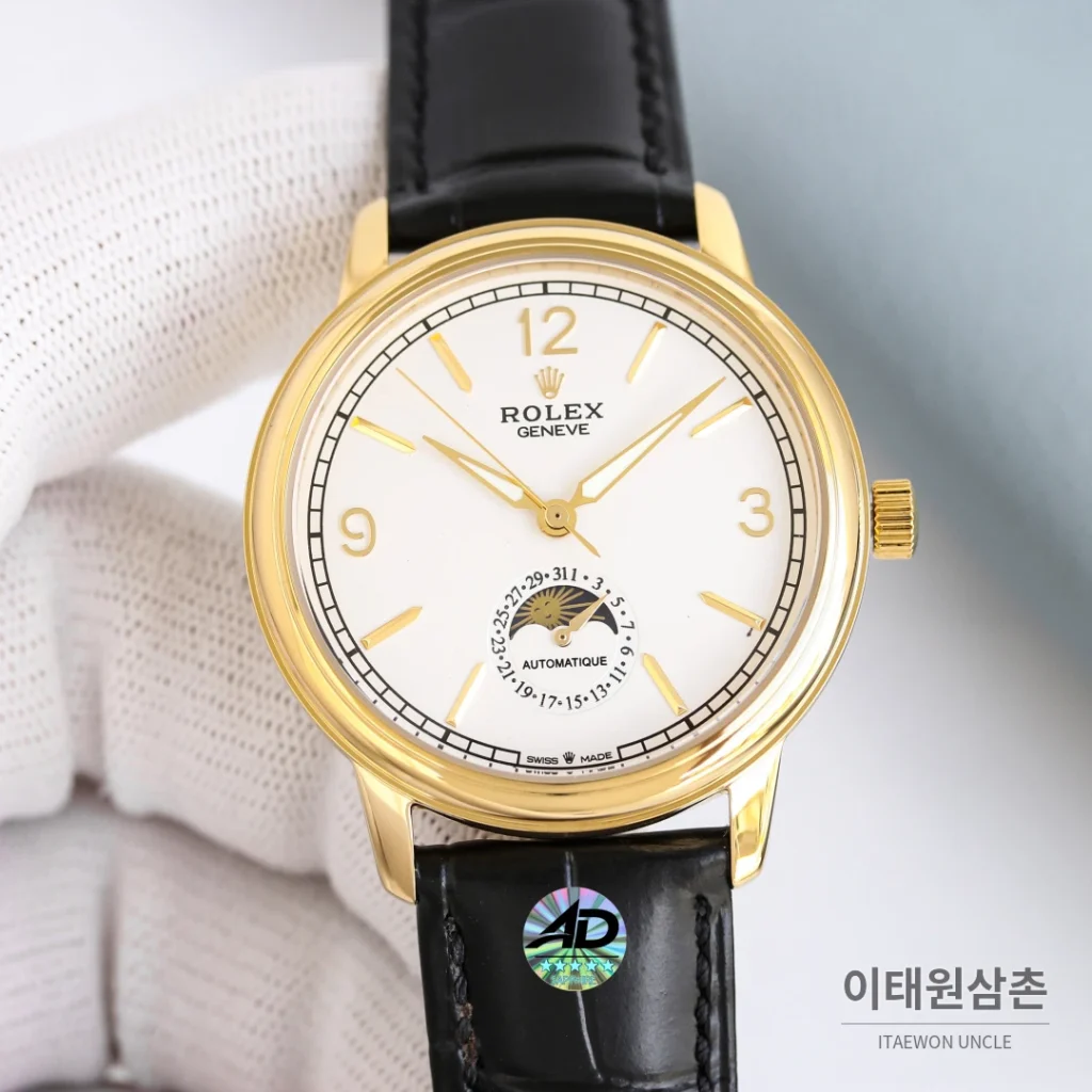 롤렉스 첼리니 문페이즈 스틸 문페이즈 오토매틱 40mm 화이트 다이얼 블랙 가죽 스트랩 골드 베젤