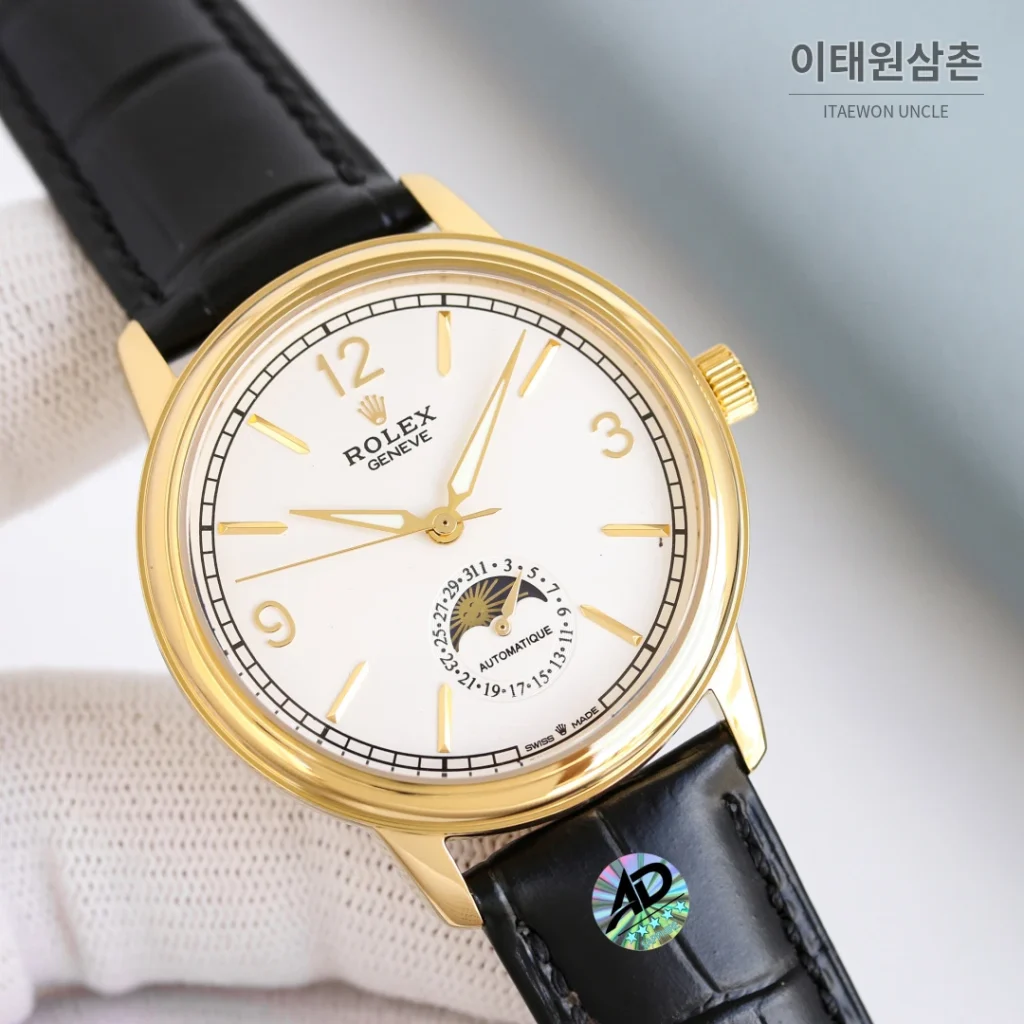 롤렉스 첼리니 문페이즈 스틸 문페이즈 오토매틱 40mm 화이트 다이얼 블랙 가죽 스트랩 골드 베젤