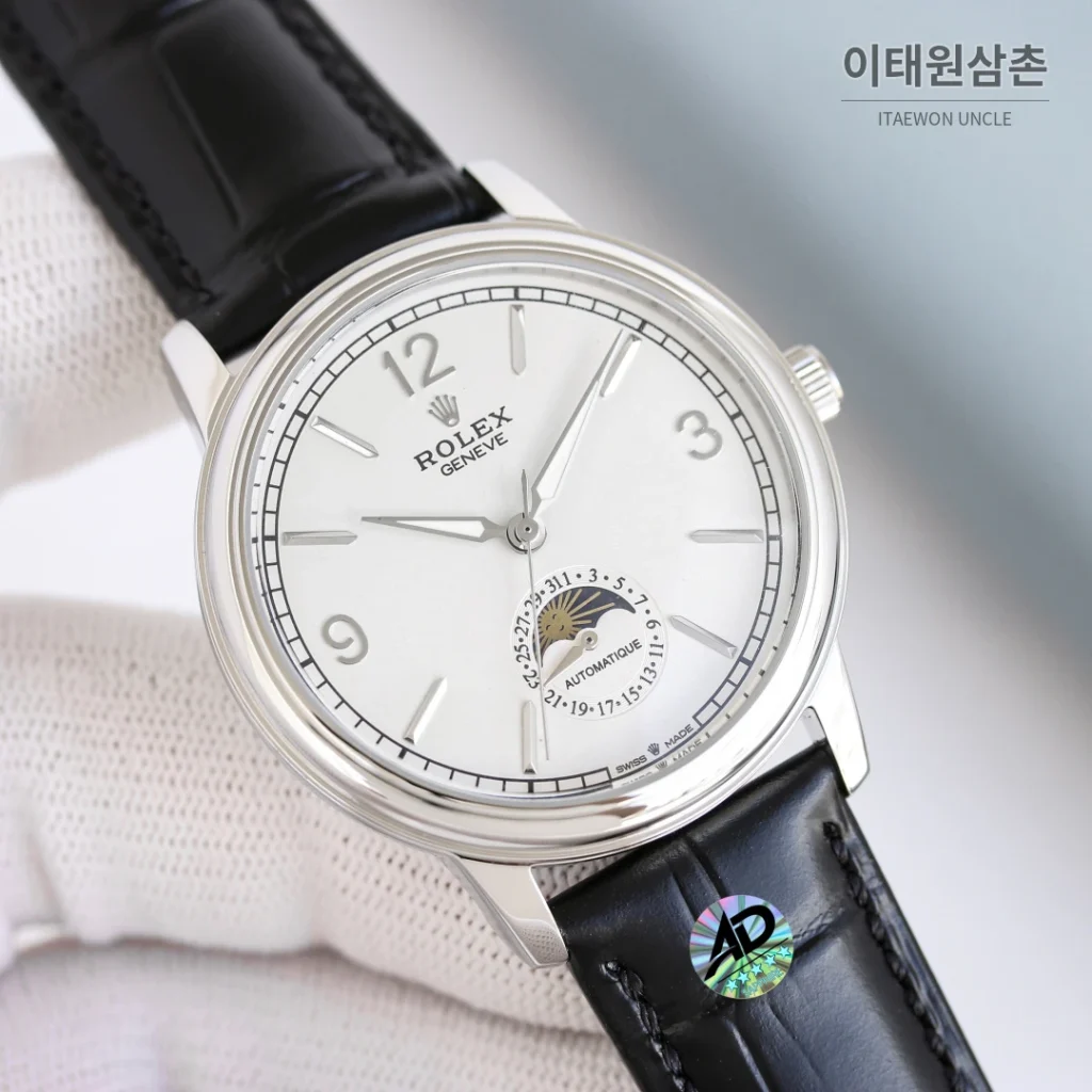 롤렉스 첼리니 문페이즈 스틸 문페이즈 오토매틱 40mm 화이트 다이얼 블랙 가죽 스트랩