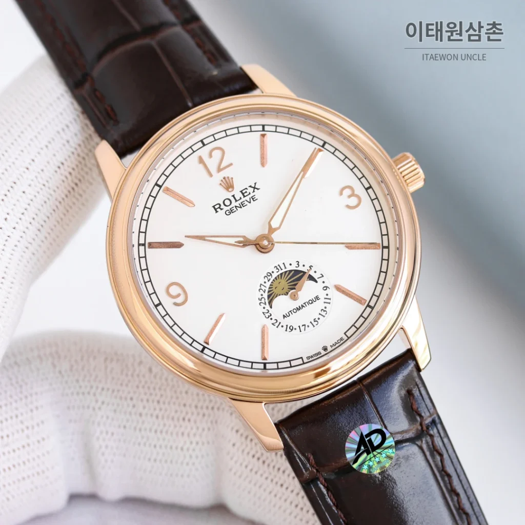 롤렉스 첼리니 문페이즈 스틸 문페이즈 오토매틱 40mm 화이트 다이얼 블랙 가죽 스트랩 골드 베젤