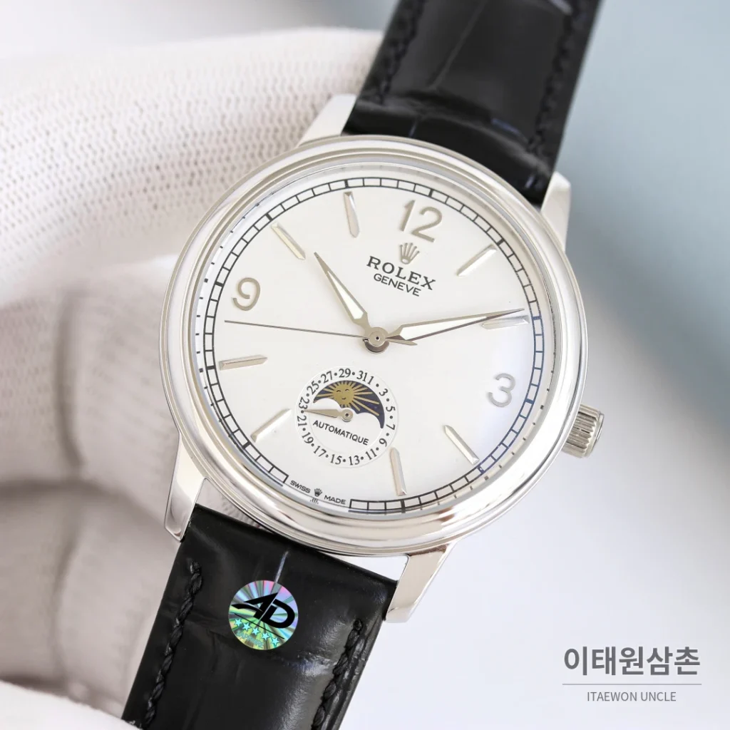 롤렉스 첼리니 문페이즈 스틸 문페이즈 오토매틱 40mm 화이트 다이얼 블랙 가죽 스트랩