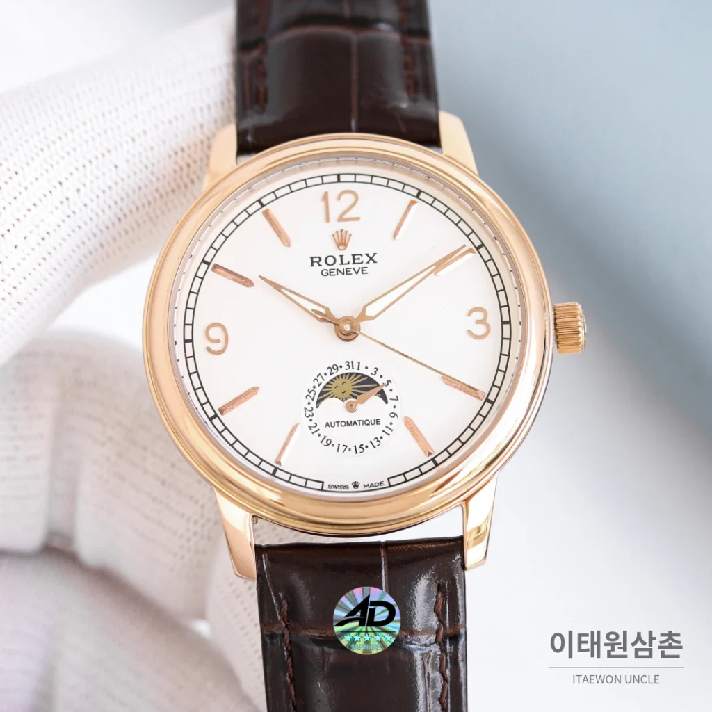 롤렉스 첼리니 문페이즈 스틸 문페이즈 오토매틱 40mm 화이트 다이얼 블랙 가죽 스트랩 골드 베젤