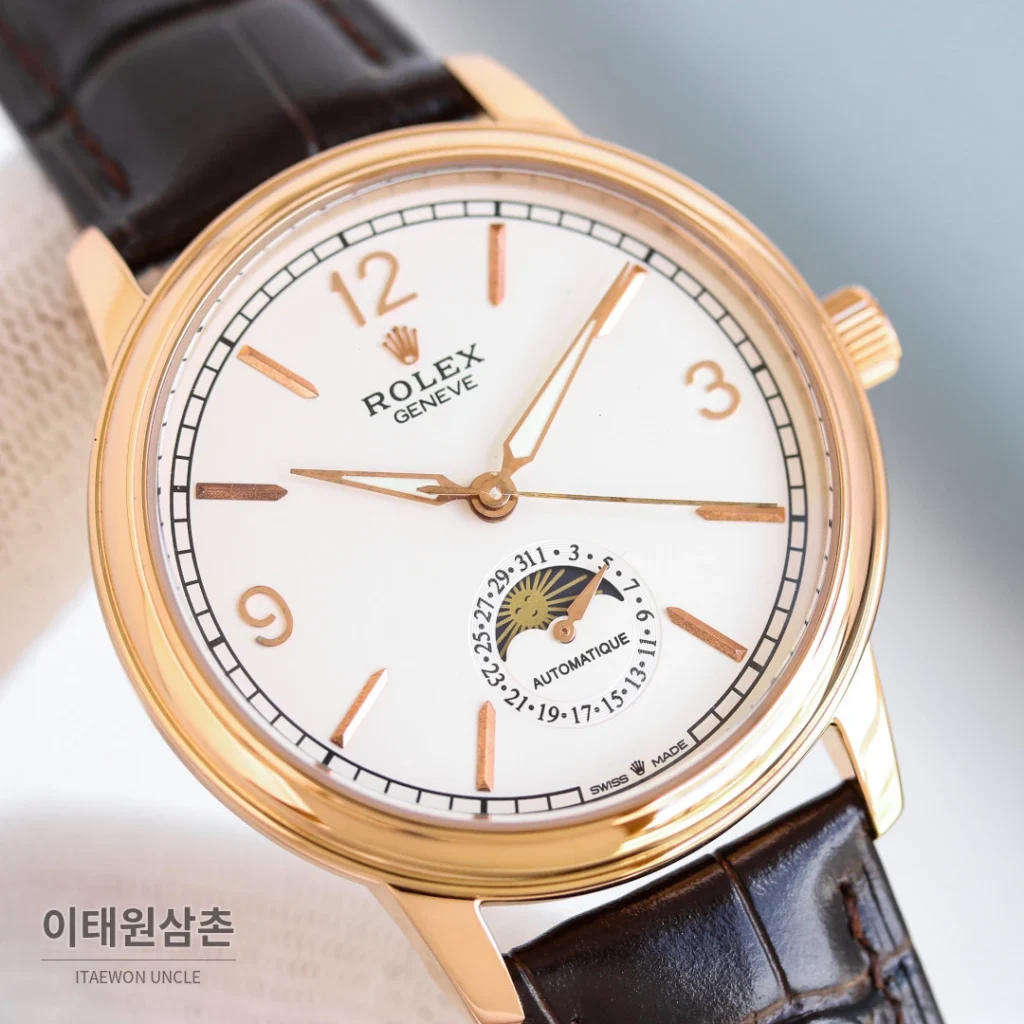 롤렉스 첼리니 문페이즈 스틸 문페이즈 오토매틱 40mm 화이트 다이얼 블랙 가죽 스트랩 골드 베젤