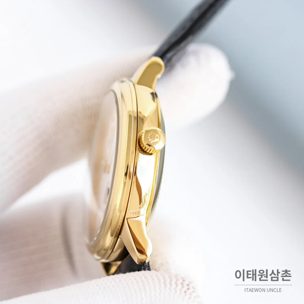 롤렉스 첼리니 문페이즈 스틸 문페이즈 오토매틱 40mm 화이트 다이얼 블랙 가죽 스트랩 골드 베젤