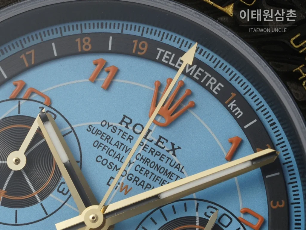 롤렉스 코스모그래프 데이토나 카본 스켈레톤백 크로노그래프 40mm 아이스블루 다이얼 오렌지 나일론 스트랩 블랙 베젤