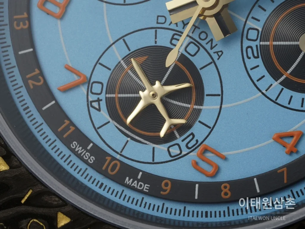 롤렉스 코스모그래프 데이토나 카본 스켈레톤백 크로노그래프 40mm 아이스블루 다이얼 오렌지 나일론 스트랩 블랙 베젤
