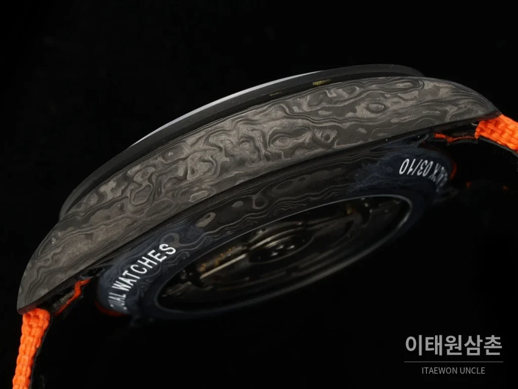 롤렉스 코스모그래프 데이토나 카본 스켈레톤백 크로노그래프 40mm 아이스블루 다이얼 오렌지 나일론 스트랩 블랙 베젤