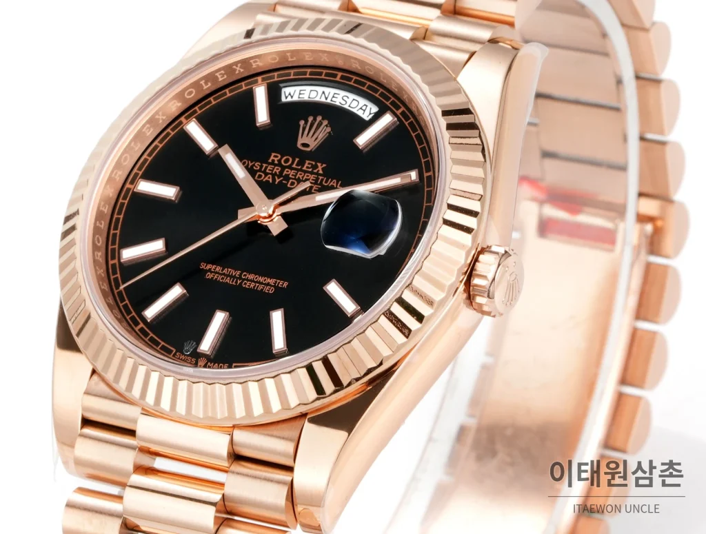 롤렉스 데이데이트 40 골드 프레지던트 브레이슬릿 오토매틱 40mm 블랙 다이얼 로즈골드 베젤
