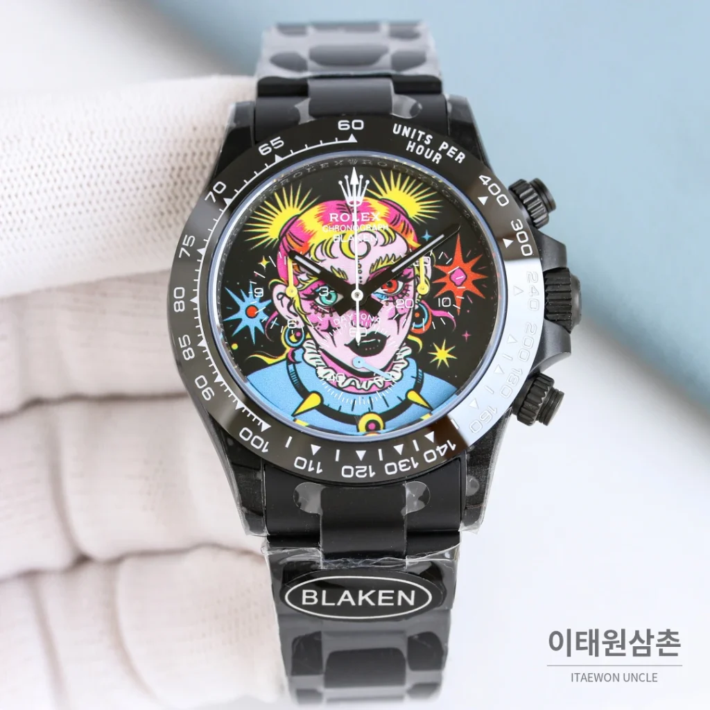 롤렉스 데이토나 크로노그래프 오토매틱 40mm 멀티컬러 다이얼 블랙 러버 스트랩 블랙 베젤