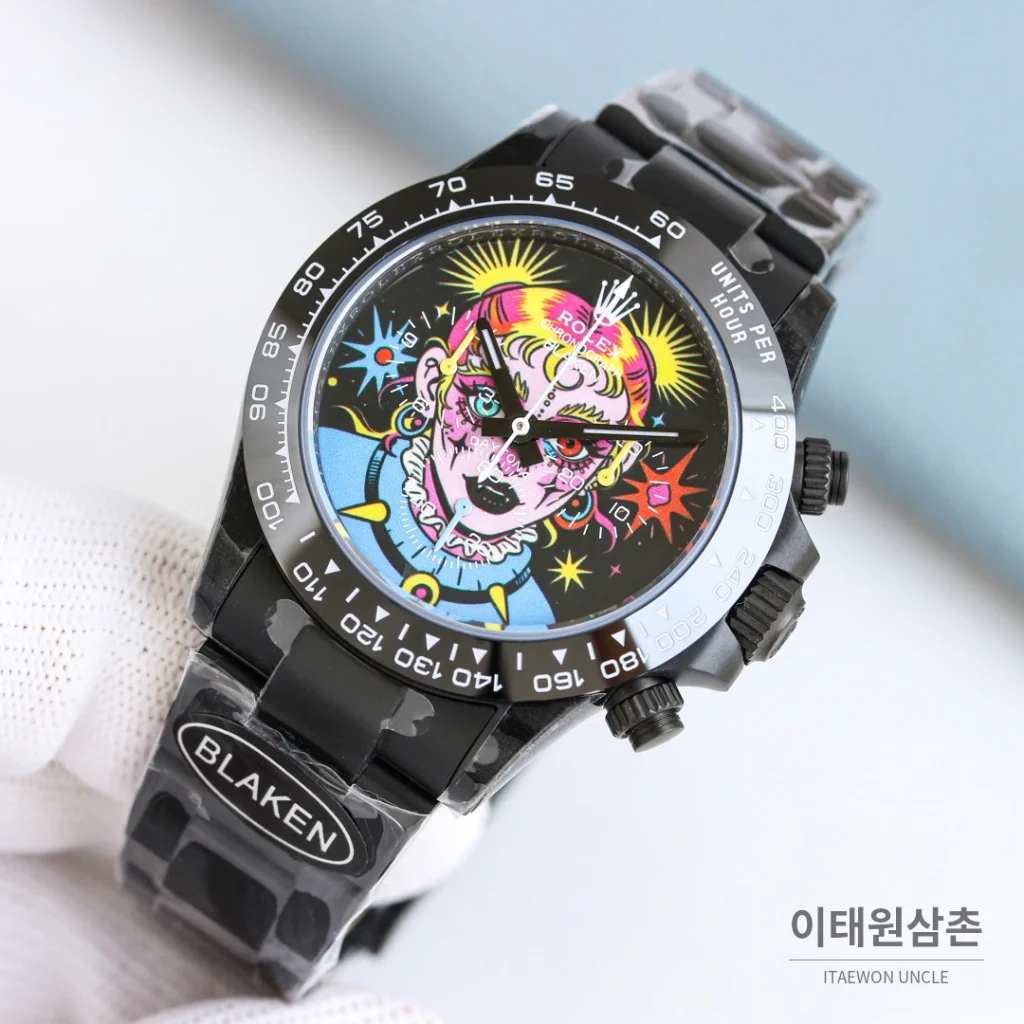 롤렉스 데이토나 크로노그래프 오토매틱 40mm 멀티컬러 다이얼 블랙 러버 스트랩 블랙 베젤