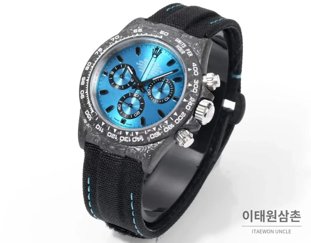 롤렉스 데이토나 크로노그래프 오토매틱 40mm 아이스블루 다이얼 블랙 나일론 스트랩 그레이 베젤 카본 케이스