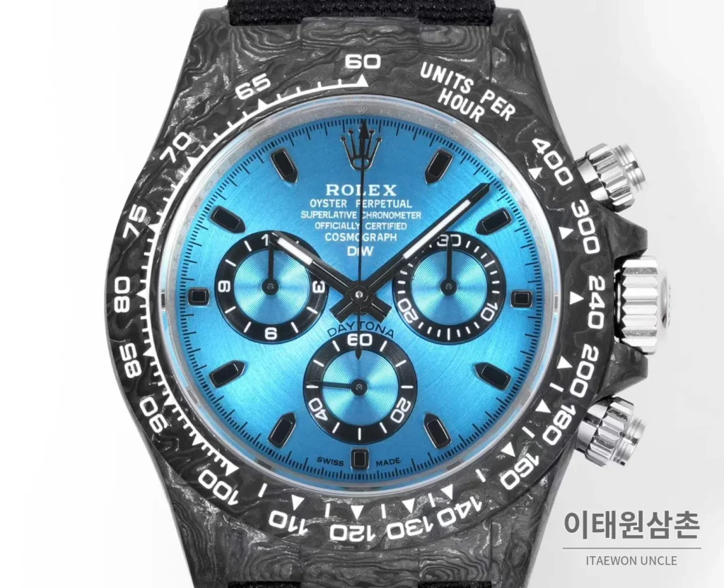 롤렉스 데이토나 크로노그래프 오토매틱 40mm 아이스블루 다이얼 블랙 나일론 스트랩 그레이 베젤 카본 케이스