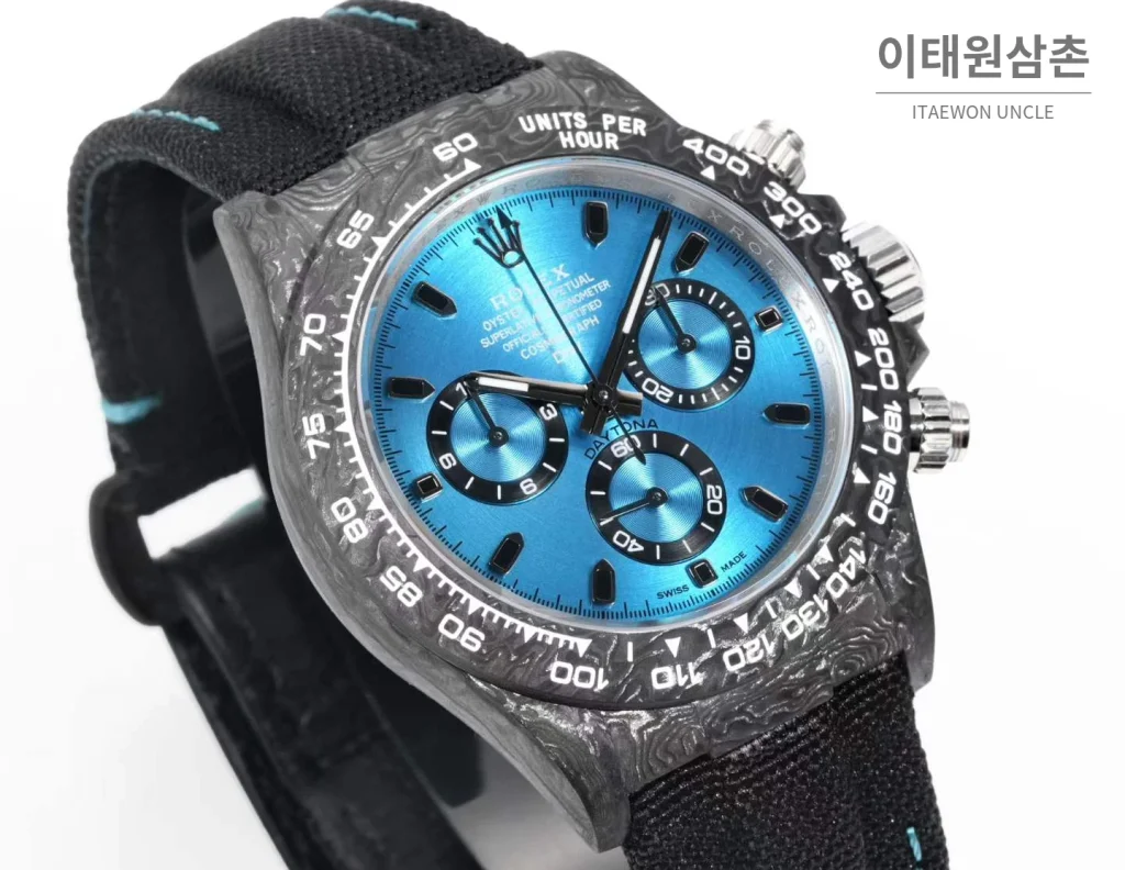 롤렉스 데이토나 크로노그래프 오토매틱 40mm 아이스블루 다이얼 블랙 나일론 스트랩 그레이 베젤 카본 케이스