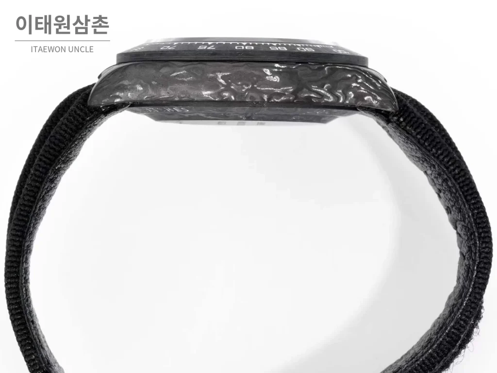 롤렉스 데이토나 크로노그래프 오토매틱 40mm 블랙 다이얼 블랙 나일론 스트랩 블랙 베젤 카본 케이스