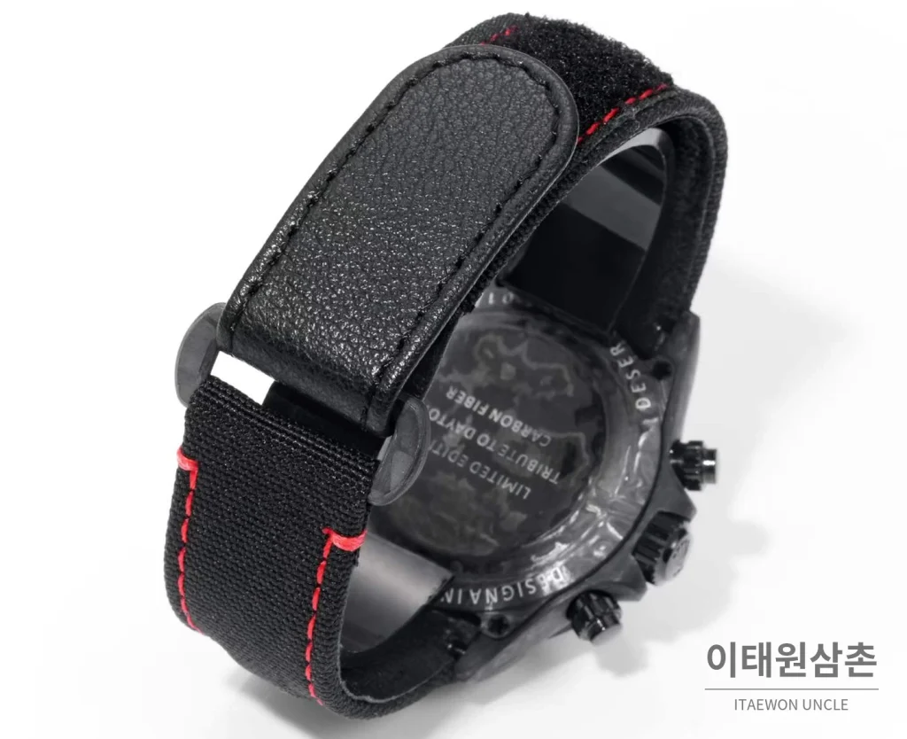 롤렉스 데이토나 크로노그래프 오토매틱 40mm 블랙 다이얼 블랙 나일론 스트랩 블랙 베젤 카본 케이스