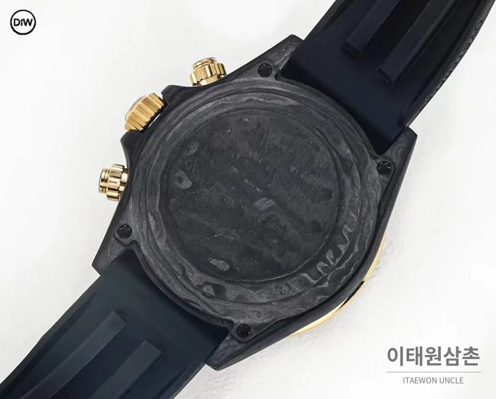 롤렉스 DIW 카본 레인보우베젤 데이토나 크로노그래프 핑크 다이얼 블랙 러버 스트랩