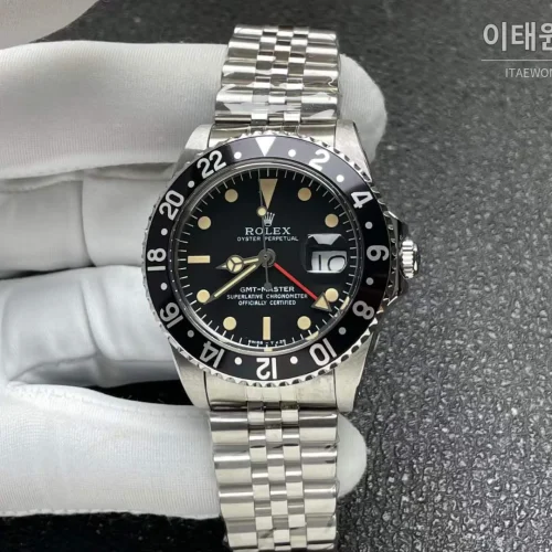 롤렉스 GMT 마스터 II 빈티지 그린베젤 오토매틱 40mm (2) 롤렉스 GMT 마스터 II 빈티지 그린베젤 오토매틱 40mm (2)