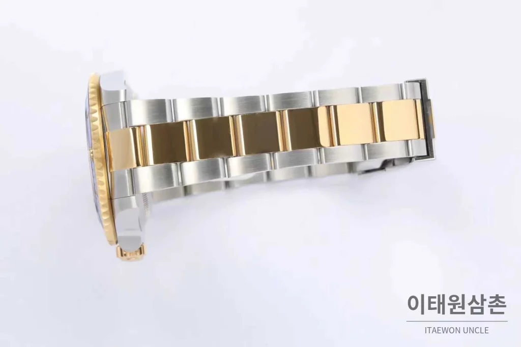 롤렉스 서브마리너 스틸 골드톤 세라믹베젤 블랙다이얼 다이버 오토매틱 41mm 블랙 / 골드 투톤 브레이슬릿