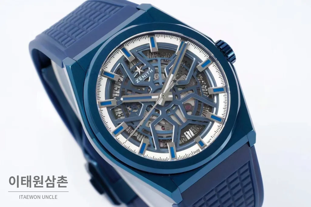 제니스 디파이 스켈레톤 스틸 스타다이얼 오토매틱 41mm 블루 러버 스트랩 블루 베젤