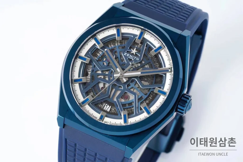 제니스 디파이 스켈레톤 스틸 스타다이얼 오토매틱 41mm 블루 러버 스트랩 블루 베젤