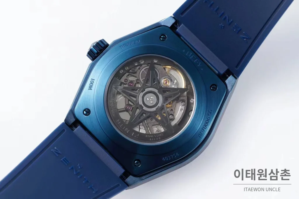 제니스 디파이 스켈레톤 스틸 스타다이얼 오토매틱 41mm 블루 러버 스트랩 블루 베젤